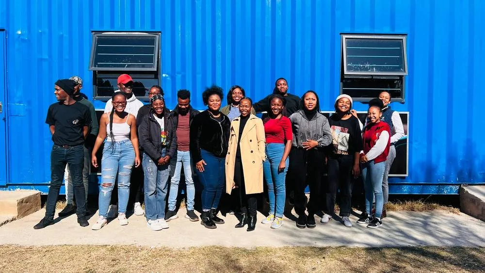 Cohort outside a container lab